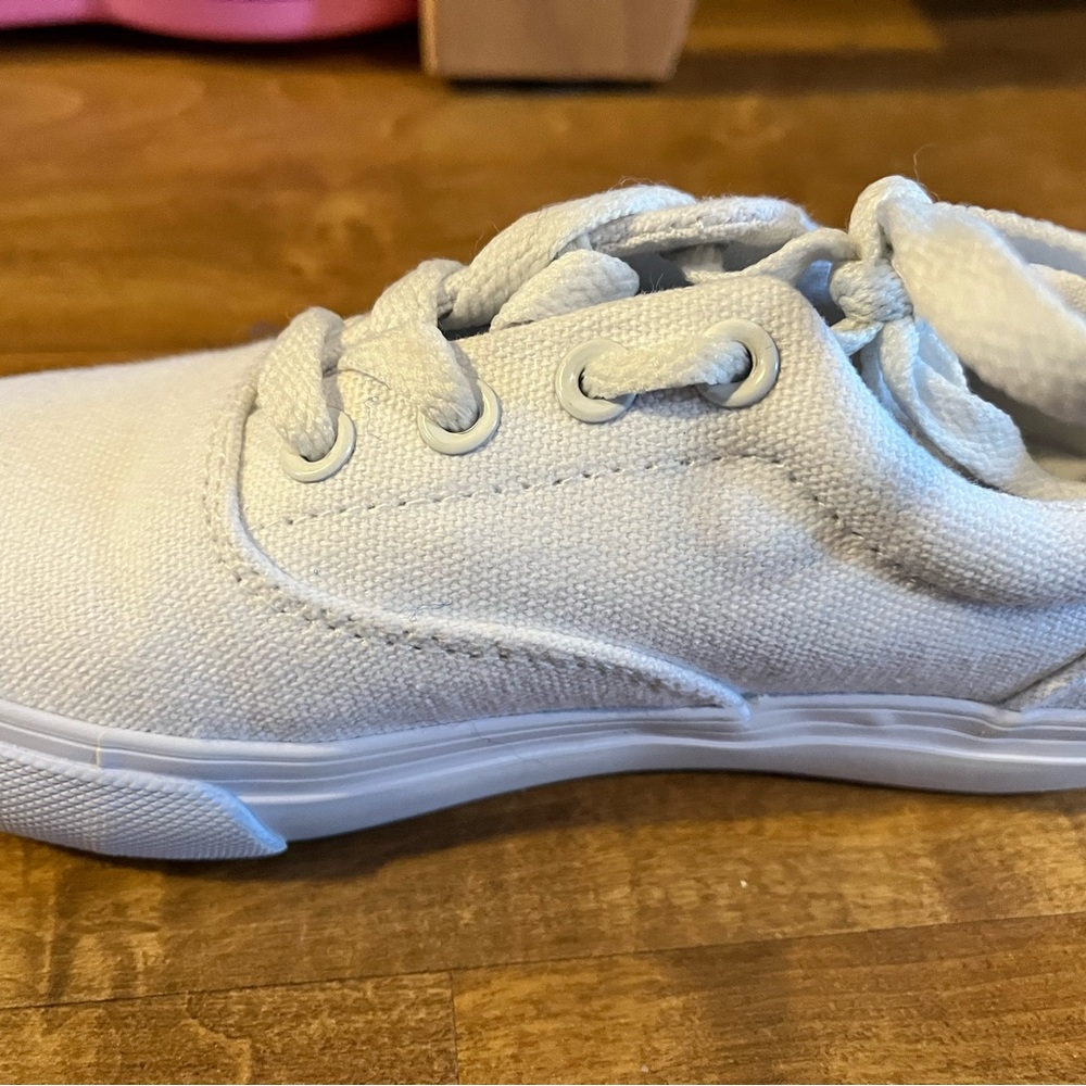 Girls white sneakers: worn once for a cheer competition. Size 11.